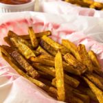 Yes, you can make crispy seasoned baked French fries at home without deep-frying in vegetable oil. Skip the drive thru and precooked frozen packages with chemicals, preservatives, and unhealthy oils. Try making your own hand cut homemade baked fries instead.