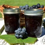 Make and preserve your own homemade Concord grape jelly! Concord grapes have a slightly tart, musky flavor but can be transformed into a delicious grape jelly with a little sweetening. This old-time favorite is sweetened with honey in this recipe.