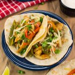 These chicken fajitas are made with strips of chili-lime seasoned chicken breast, tossed with vibrant peppers, onions, and wrapped in warm flour tortillas.