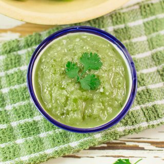 This simple roasted tomatillo salsa recipe is easy to make. Roasting the vegetables adds a delicious smoky flavor and mellows the acidity of the tomatillos. Enjoy this salsa verde with your favorite Mexican dishes.